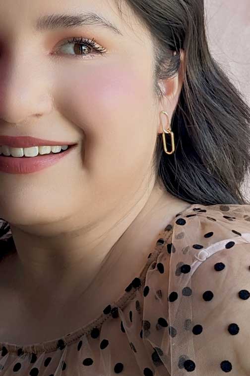 Gold Paperclip Earrings on a model