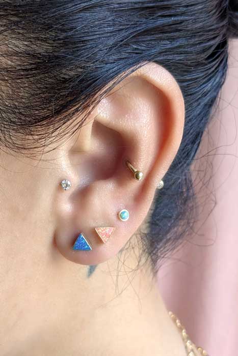Opal earrings on a model