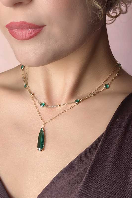 Model wearing Green pendant on a gold chain