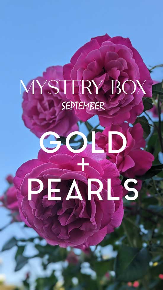Load image into Gallery viewer, Floral background and announcement that September&amp;#39;s mystery box is gold and pearls
