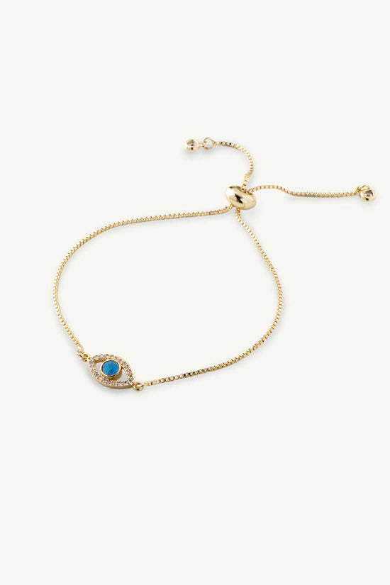 Load image into Gallery viewer, Stacking minimalist dainty gold bracelet with evil eye and blue opal. Trendy opal jewelry from Lavender Skyline
