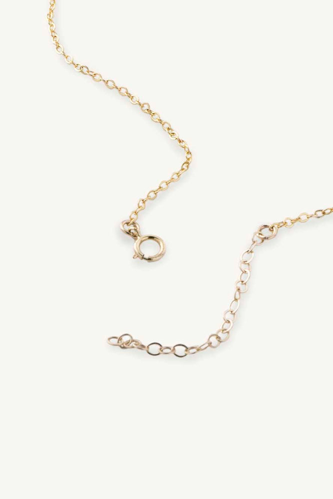 
                  
                    layering gold jewelry. Brand based in San Francisco 
                  
                