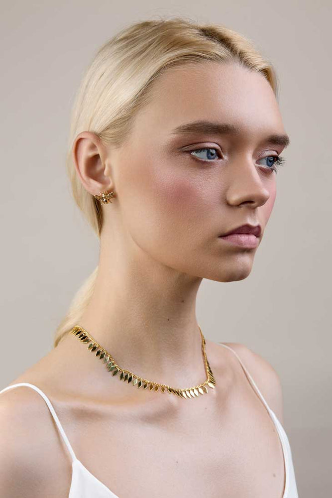 
                  
                    San Francisco based Lavender Skyline's gold bee earrings
                  
                