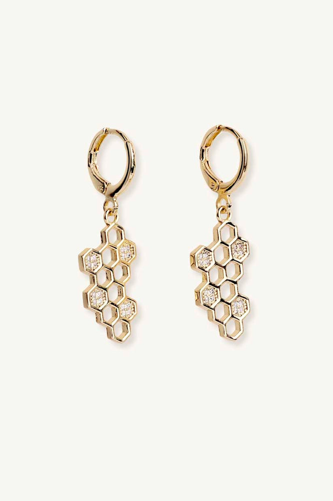 
                  
                    Honeycomb charm earrings on a white background
                  
                