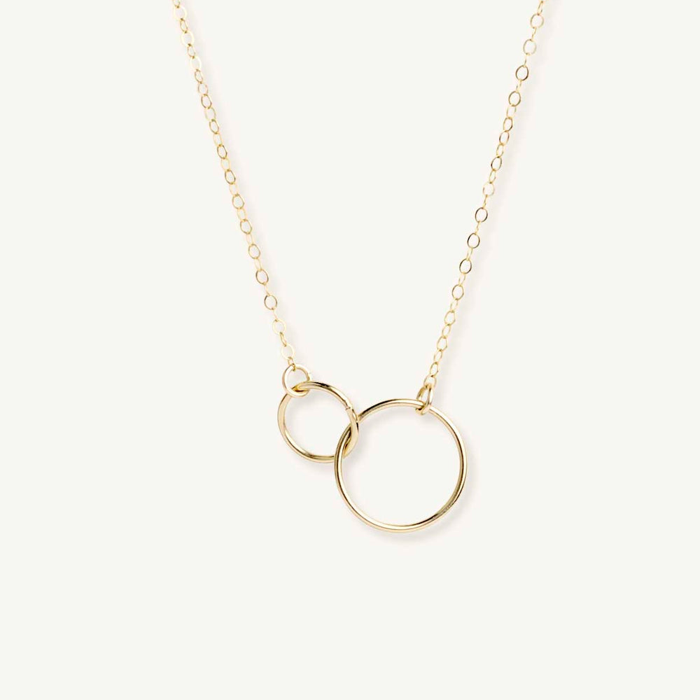 
                  
                    Interlocked circles dainty gold necklace
                  
                