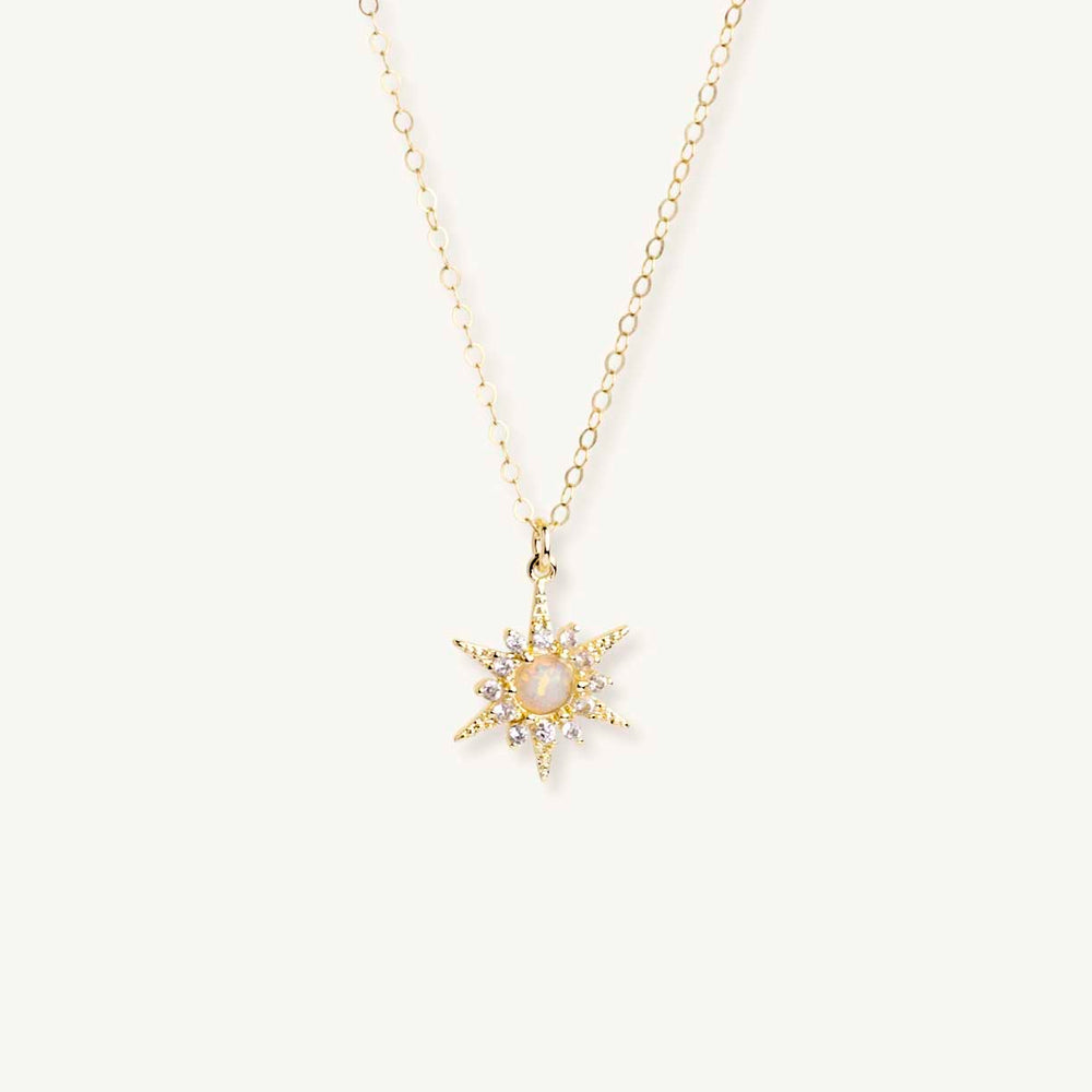 White opal sunburst gold pendant necklace
