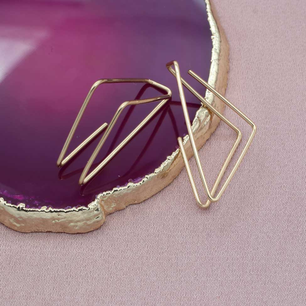 
                  
                    Double triangle thread through hoop earrings
                  
                